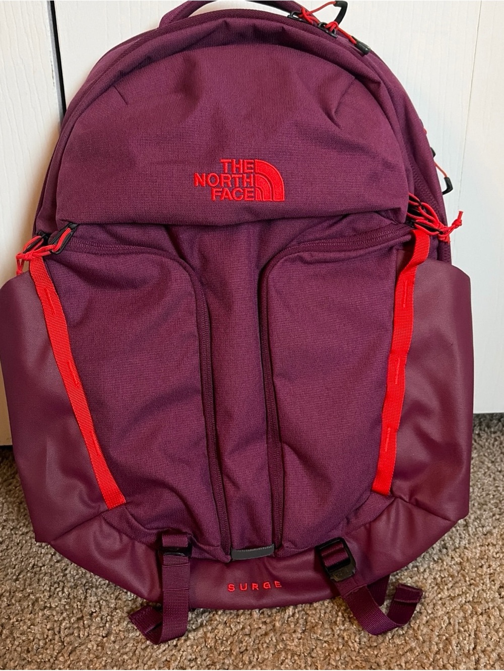 The North Face Women’s Surge Backpack in Boysenberry Lt Heather/Fiery Red